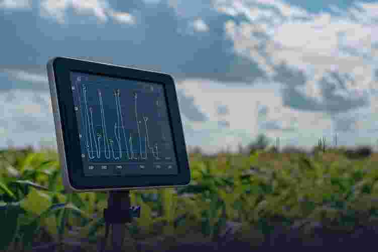 agriculture technology concept man Agronomist Using a Tablet Internet of things report