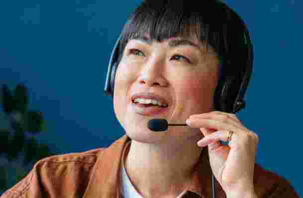 A customer service representative with a headset microphone